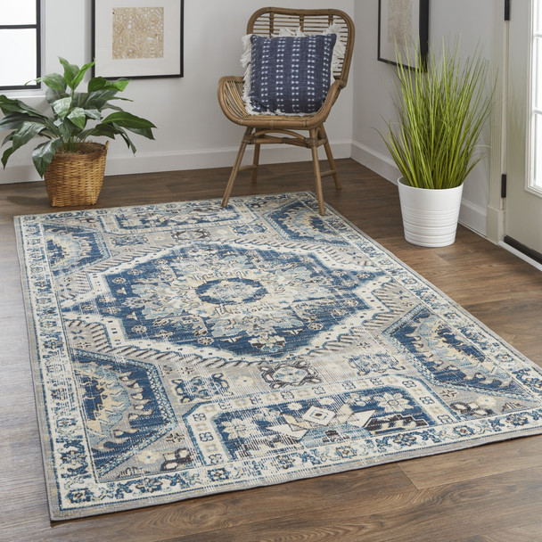 10' X 13' Blue And Ivory Abstract Power Loom Distressed Stain Resistant Area Rug