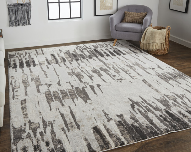 7' X 10' Ivory Brown And Gray Abstract Power Loom Stain Resistant Area Rug