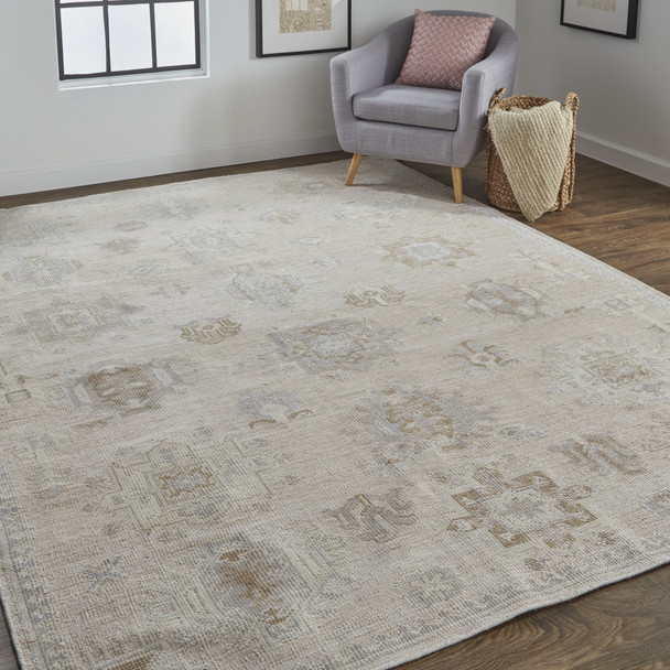 8' X 10' Tan And Brown Floral Hand Knotted Stain Resistant Area Rug