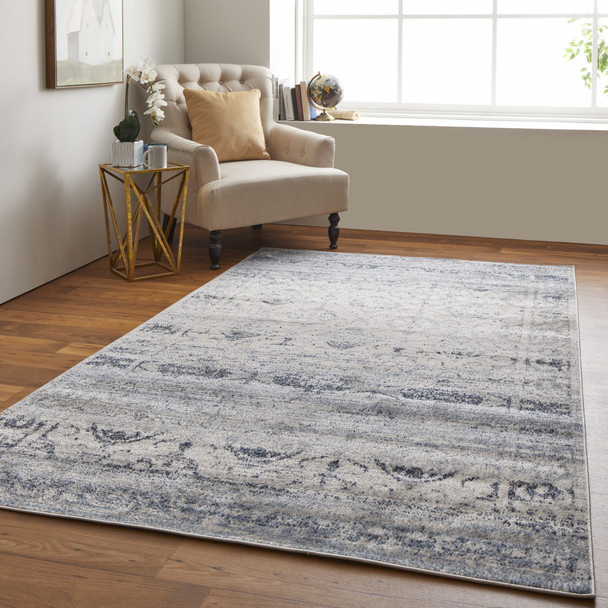 8' X 10' Blue And Ivory Power Loom Distressed Area Rug