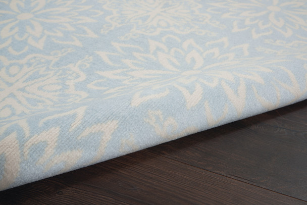 5' X 7' Light Blue Floral Power Loom Area Rug