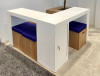 Custom 10' x 10' White Trade Show Booth with White Corner Desk & 4 Padded Seats