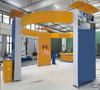 Custom 20x20 Trade Show Booth – Modern Circular Overhead Structure with Kiosk & Display Panels BRAND NEW