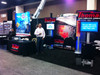 Custom Metalli Piatto Tradeshow Booth with Free-Standing Kiosks and Mounted TVs