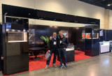 Recently Sold Used Booth! - Striking 10' x 20' with black wall panels