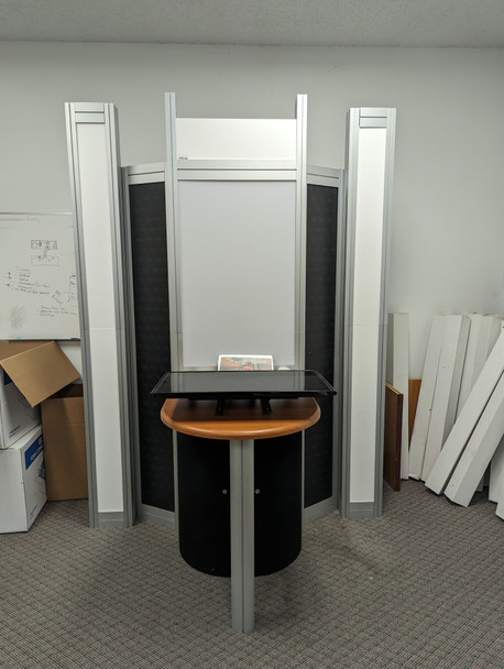 10x10 Nimlok Aluminum Booth with Table, Locking Storage, and TV Mount