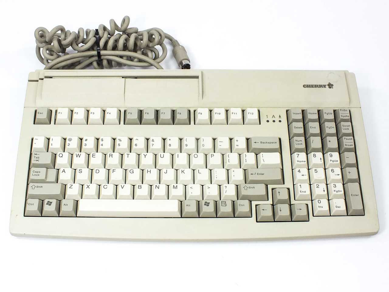 Cherry D-91275 Mini PS2 7000 Keyboard - Compact design, Cherry brand, compatible with PS2 devices
