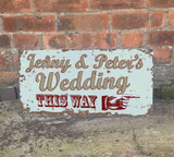 distressed vintage style personalised metal directional wedding sign