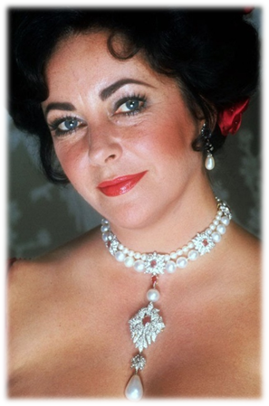 Actress Elizabeth Taylor wearing La Peregrina Pearl