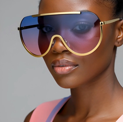 shield sunglasses, oversized sunglasses, one piece lens, gold frame sunglasses, fashion sunglasses, visor sunglasses, rimless sunglasses, statement sunglasses, festival sunglasses, futuristic sunglasses, designer inspired, trendy sunglasses