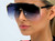 shield sunglasses, oversized sunglasses, fashion sunglasses, visor sunglasses, designer sunglasses, statement sunglasses, women's sunglasses, trendy sunglasses, modern sunglasses, gradient lenses, black sunglasses, gold sunglasses, sun protection