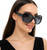 Keywords: oversized sunglasses, fashionable, gradient lenses, black frames, women's eyewear, statement sunglasses, trendy, sun protection, chic, stylish, large frame, modern, glamorous