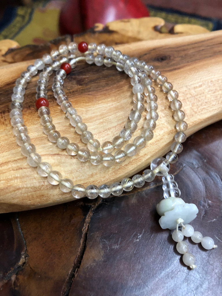 White Zambala Crystal Mala with Lotus Guru Bead 