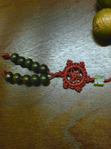 Green Sandalwood Engraved Heart Sutra Wrist Mala - 25 mm 