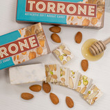 Torrone – Soft Italian Nougat with Almonds & Pistachios, Made with Local Honey

Experience the authentic taste of handmade Italian Torrone from Villa Italia Bakery. Our soft nougat is crafted using local honey, fresh egg whites, sugar, and premium California almonds and pistachios for a rich, chewy texture and perfectly balanced sweetness.

This gourmet Italian candy is a beloved choice for holidays, weddings, dessert boards, and gifting. Its soft bite and natural honey flavor make it one of the most traditional Italian confections—now available for nationwide delivery.