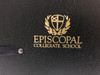 Example of Logo : Episcopal School, on a choir folder (note the hand strap rivet )