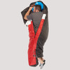 Sierra Designs Synthesis 20 sleeping bag, black/red, front view, with man sleeping on his side