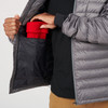 Close up of man wearing Sierra Designs Men's Sierra Jacket, showing interior storage pocket