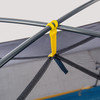 Close up of Sierra Designs Full Moon 2 tent, showing yellow plastic pole clip