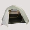 Sierra Designs Nomad 6 tent, white/green, front view, with fly attached and door opened. Door to tent is also opened.