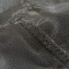 Close up of Sierra Designs Adult Packable Rain Jacket, showing taped interior seams