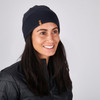 Woman wearing Sierra Designs Cleo Reversible Beanie Midnight Navy / Cornstalk