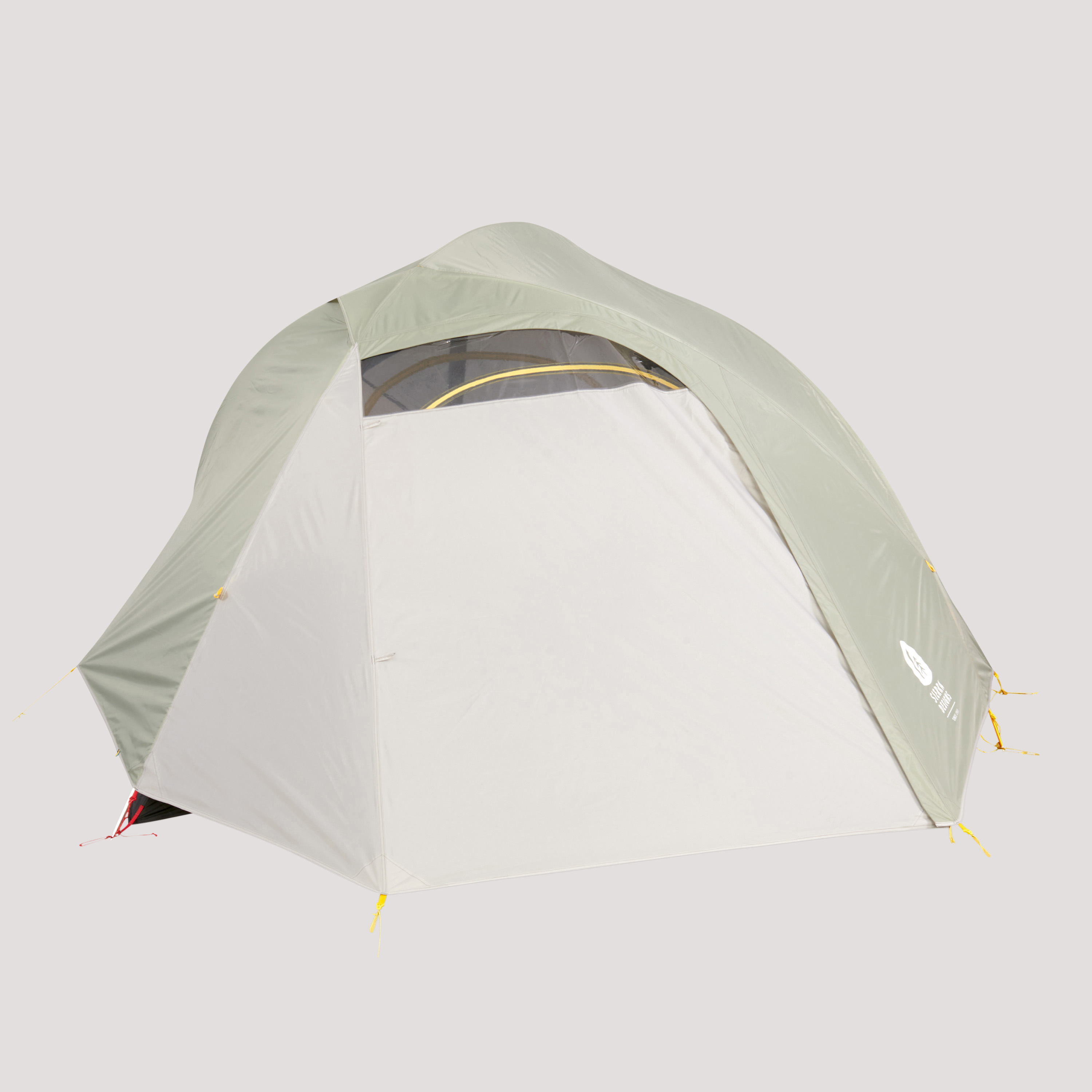 Sierra Designs Nomad 4 tent, white/green, front view, with fly attached and fully closed