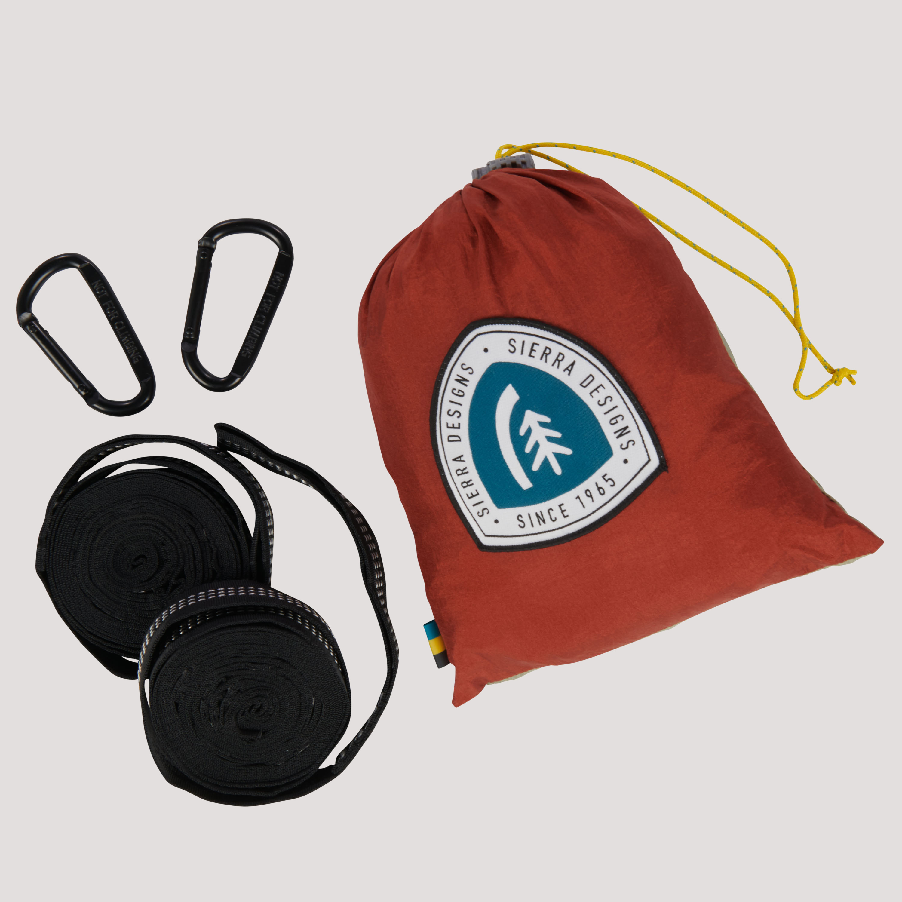 Sierra Designs Double Lightweight Hammock, shown packed in storage bag, with accessories next to it