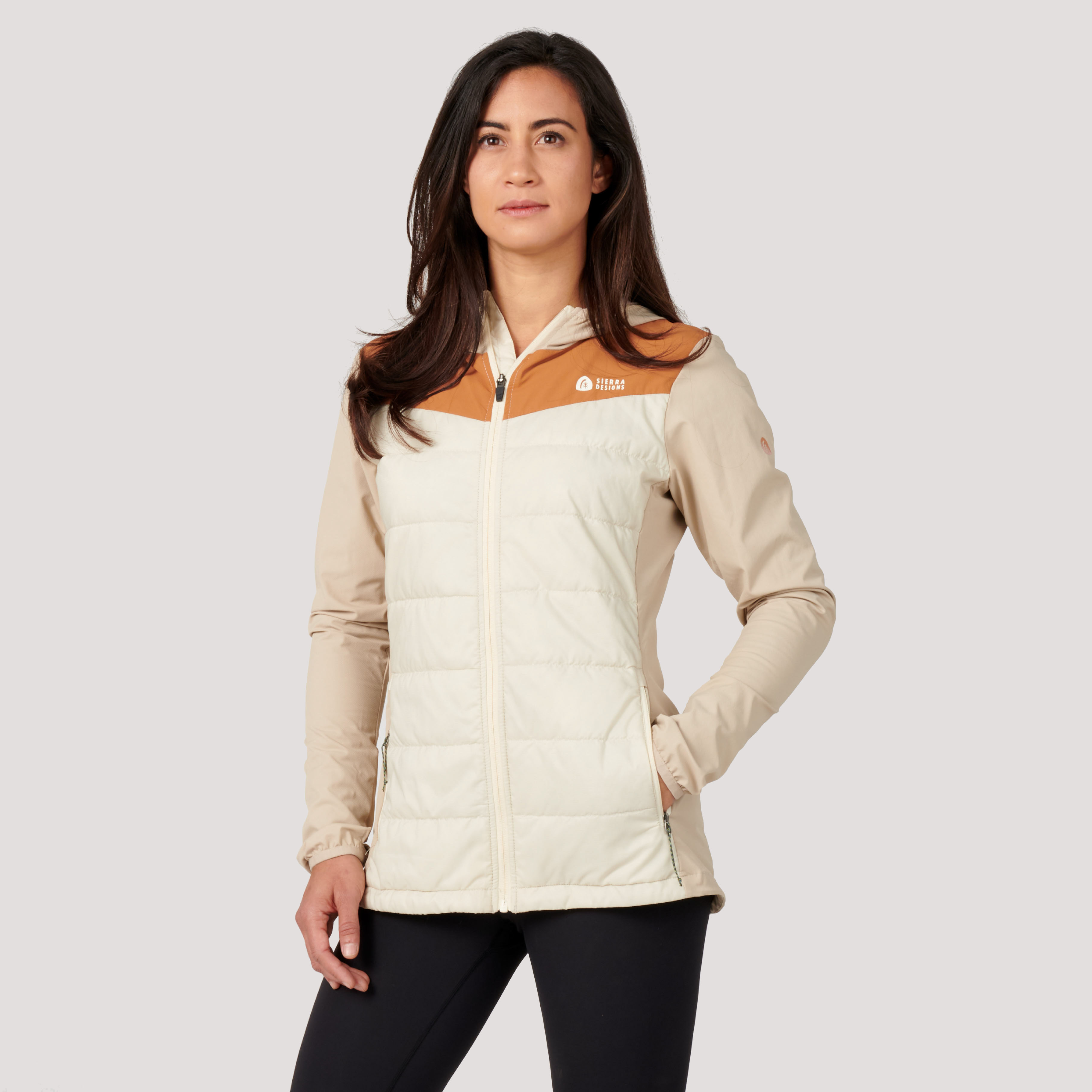 Woman wearing Sierra Designs Women's Borrego Hybrid Jacket, front view