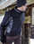 Black/Charcoal-Man wearing the Insulated Softshell Jacket outside