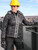Black/Charcoal-Woman in the Women's Pure-Soft Puffer Jacket on top of a building