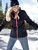 Woman wearing the Women's Softshell Jacket in the snow