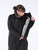 Model unzipping the Women's Insulated Softshell Jacket