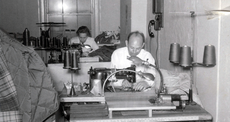 Myron Breakstone at a sewing machine