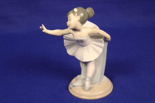 Lladro "My First Bow" Figurine