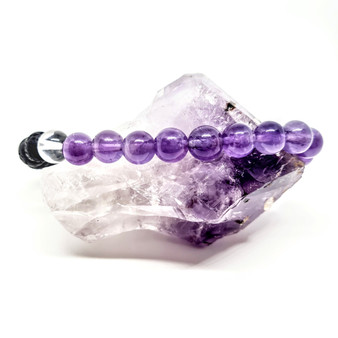 Clear your mind & relax with clarity.  Amethyst is often worn when one seeks to find intuition in life, clarity about decisions & direction with divine communications. Widely known as good for headaches, the calming vibrational energy flows with you, encouraging peaceful sleep. It's deep indigo purple colour is one that you can easily get lost in, especially good for any fear of the dark.

Amethyst's tranquil energy can be most beneficial to those with Obsessive Compulsive Disorder. Amethyst may bring a little inner calm to hyperactive children. It is also found helpful in bringing a gentle sense of comfort for thoughts when worn everyday.

Also known to clear negative energy from your Aura.

Birthstone: February 

Zodiac: Aquarius

Chakra: Third Eye

Oil Roller: RELAX Lavender Oil with Amethyst gemstones and Gold Leaf!
Amethyst's tranquil energy can be most beneficial to those with Obsessive Compulsive Disorder. Amethyst may bring a little inner calm to hyperactive children. It is also found helpful in bringing a gentle sense of comfort for thoughts when worn everyday.

Also known to clear negative energy from your Aura.

Birthstone: February 

Zodiac: Aquarius

Chakra: Third Eye

Candle colour: Purple

Meditate with your bracelet in hand and Clarify your intentions by speaking your desires. Fill your room with your chosen scent & really pull together the perfect meditation environment. You can place your bracelet upon desired chakra whilst lying flat & concentrate on the mantra to inspire wise & positive change in all decisions your make. 

Activate your senses with essential oils for your intended use by placing a few drops onto your lava beads, rub in and let it soak in. Re-apply weekly or more often if you like. Remove by rinsing under running water.