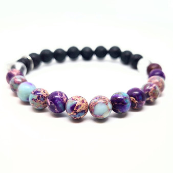 Purple Sea Sediment Jasper connects with your higher heart + collective consciousness of higher realms. Strengthening your body, mind + soul. Bringing tranquility + light to you life with a soothing low vibrational emotional healing energy. For clarity, compassion, inner peace + love. Purple Sea Sediment Jasper is an attractive stone with an abundance of depth. Providing soothing protection from negativity whilst encouraging peace in  life. Carrying a strong connection to the earth's energy, it is believed to fight fatigue and exhaustion.

Chakra: Root

Candle colour: Purple

Vibration: Low