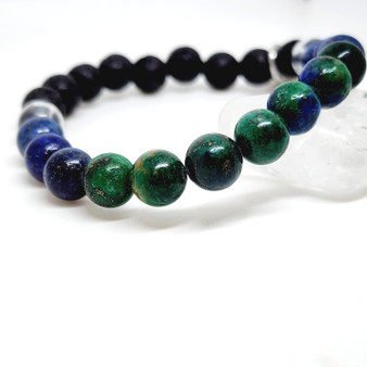 Stone Tree Collection's Azurite Crystal Bracelet is a third eye chakra stone who's energy embraces inspirational creativity, intuition + spiritual wisdom. It is a stone of higher truth and honesty, maturity & responsibility. Azurite is a stone to clear the mind of negative psychic debris. Azurite is a natural occurance of Malachite and Lapis Lazuli. Our Bespoke Crystal Bracelet designs include Clear Quartz as an amplifer of surrounding crystals energies. Add our Refillable Oil Roller "Stress Relief" with Lavender Oil and Amethyst Chips swirled in gold leaf with an Amethyst roller ball to your cart to enjoy the Aromatherapy benefits too!

Zodiacs: Virgo, Libra

Chakras: Thrid Eye, Heart

Mantra: "I can reach the stars" 

Oil Roller: Lavender Oil with Amethyst Chips + Gold Leaf