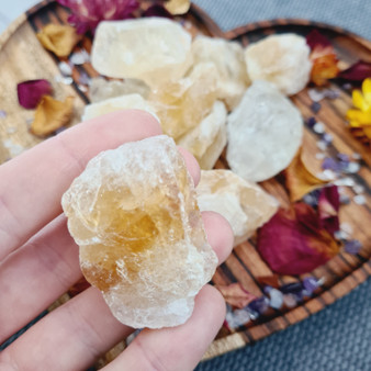 These chunks of Citrine are raw. This means they are not polished and may have inclusions of other minerals. All chunks vary in size.

Citrine is a stone of abundance. Energies that increase the attraction of wealth + success. Also boasting vital energies that assist vitality. Citrine is a pure stone of joy + happiness and if you are hoping to improve your focus during manifestation, Citrine is you new best friend. 

Citrine's energies algin with the Solar Plexus chakra - our creative life force chakra. 

Chakra: Solar Plexus

Zodiac: Leo

Approx: 42x29x20mm