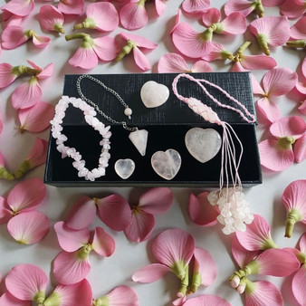 An abundance of loving energy!

This 7 piece GIFT SET is ready to present to your loved ones.

Rose Quartz Properties: Rose Quartz is the stone on universal love, compassion and emotional healing. Bringing a settled and calm sense of peace into the body and mind. 

Included: Rose Quartz Chip Bracelet, Rose Quartz Pendulum, Rose Quartz Hanger for car, bag or home, four assorted sizes Rose Quartz Heart Stones