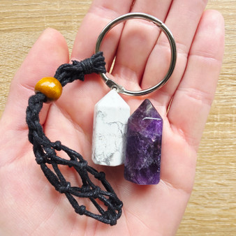 Amethyst Keychains have an easy open clasp that securely holds onto any bag or accessory you attach it to. Black macrame cotton surrounds and holds your Amethyst Point, protecting it from rough surfaces. You can remove your Amethyst Point from the pouch to hold in the palm with the point facing inwards, during meditations. 

2 for $19 at cart

This is Brazilian Amethyst which encourages the holder to relax, clear their thoughts and focus on their own intuition. As a stress relieving stone you can also keep this under your pillow for a peaceful sleep or to soothe headaches and migraines. If you have OCD, ADD or ADHD Amethyst Energy is for you!
