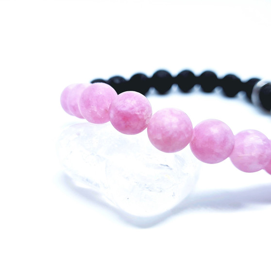 Purple Jade is white jade with a splash of purple! 

This raw crystal can provide laughter + light promoting a full spiritual awakening. Purple Jade is a crystal to help one heal their own emotional hurt. Acknowledging, feeling the whole feeling, accepting how you feel or felt and letting that feeling release from your body. Purple Jade encourages patience + diplomacy, inspires inner growth + maturity and helps one focus on considering love + wisdom in every thought. Purple Jade is a great crystal for empaths. 

Chakra: Heart + Crown