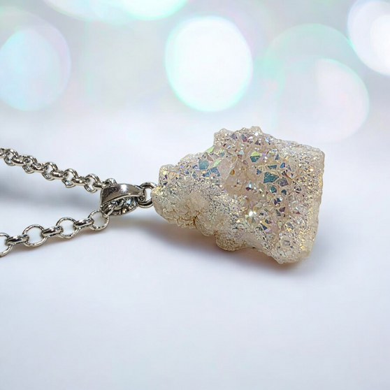 A gorgeously small cracked Geode with elecrtoplated feature that turns this mind clearing quartz Beauty into our best necklace yet!

Quartz is known as the Master Healer. If you only ever own one stone, you better make it quartz! For all healing, manifesting, energizing, inspiring, creating, cleansing and amplifying. Our Quartz Geodes resonate with our physcial, mental and emotional being. Sending away negative energy and stimulating the immune system. Encouraging spiritual growth, spirituality and wisdom. This stone may bring clarity to the mind and thought process, even clarity of emotions. Assisting with focus, especially studying and concentrating.  It is good for helping improve your memory, improve your energy levels, weight loss, diabetes symptoms & is said to provide some pain relief. Giving you an ongoing energy lift direct from nature.