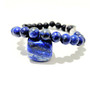 Lapis Lazuli Crystal Bracelet, Handmade in QLD Australia. Lapis Lazuli is a stone of Truth, Awareness and Wisdom. Enhancing your ability to connect with and communicate with your divine higher truth. Bring insight and new, positive perspectives to your current situation. Encouraging truth when talking to yourself, acceptance is golden. It is a good stone for practicing taking responsibility for your own actions and getting yourself noticed in a positive way. The Lapis Lazuli stone may help you on your path to self awareness and self expression. Become more aware of your actions and be more receptive to how others communicate with you. Use your creativity to write that inspiring book, finish that spectacular artwork, make that amazing performance, do what you do best with no limits or fears. Wearing Lapis Lazuli is the perfect way to deepen your communications with friends and can help bring new and long term lasting relationships. Known to remedy endocrine and nervous systems, headaches & mirgranes, lymph glands and bone marrow issues.  Can be used to soothe problems with ears and nasal passages. Aids in reducing pain and inflammation, stress and anxiety. It is also beleived to be of assistance to people with Aspergers, ADHD, ADD, OCD. Chakra: Throat. Oil Roller: Eucalptus Peppermint Oil with Clear Quartz.