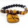 Enhance your personal power and strengthen your sense of self, your "inner strength". Tigers Eye is just a boost to self-confidence and self-esteem, coaxing out the courageous tiger that lies within your firey heart. Tigers Eye helps you in putting a stop to cycles of in-action, promoting decision making in all areas of your life. Reducing feelings of inadequacy or isolation & restoring your body's emotional balance through stability. 

Zodiac: Leo

Chakra: Sacral

Mantra:  "I am confident & successful in every thing i do"

Oil Roller: ENERGIZE Mandarin, Orange, Bergamot, Lavender Oils with Tiger Eye gemstones and Gold Leaf!