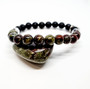 Dragons Blood is known as the ultimate stone of courage. It's determined energy is helpful in encouraging resourcefulness & finding creative ways to balance your life and attract wealth. Dragons Blood provides grounding and sense of self, as you journey towards an even more courageous version of yourself. As the name suggests it was believed to be the remains of deceased dragons with green skin and red blood. Emotionally bringing you joy, and energy in an uplifting manner. Also known as Bloodstone Jasper. Cleanse and set your intentions before you wear. Dragons Blood aligns with the Root Chakra. Dragons Blood closely aligns to the personality traits of Aries. Compliment your crystals with our Australian Pink Grapefruit Oil Roller with Obsidian Shaker Stones. Roll onto black volcanic rock beads for aromatherapy benefits. 
Dragons Blood provides grounding and sense of self, as you journey towards an even more courageous version of yourself. As the name suggests it was believed to be the remains of deceased dragons with green skin and red blood. Emotionally bringing you joy, and energy in an uplifting manner.

Zodiac: Leo

Chakra: Root & heart

Mantra:  "I am the definition of courage"

Candle colour: Green, red

Scents: Dragons blood, sandalwood

Vibration: Low