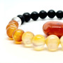 Carnelian's properties include vitality, motivation, creativity, self-confidence + memory. It clears mental fatigue and emotional negativity. It vibrates with our Sacral Chakra improving blood flow and supply for internal healing after surgeries. Find your Creativity + Passion with our Carnelian Crystal Aromatherapy Bracelet.

Zodiac: Leo, Virgo, Sagittarius

Chakra: Sacral

Oil Roller: ENERGIZE Tiger Eye Oil Roller with Gold Leaf + Mandarin/Orange/Lavender/Bergamot essential oils