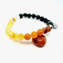 Carnelian's properties include vitality, motivation, creativity, self-confidence + memory. It clears mental fatigue and emotional negativity. It vibrates with our Sacral Chakra improving blood flow and supply for internal healing after surgeries. Find your Creativity + Passion with our Carnelian Crystal Aromatherapy Bracelet.

Zodiac: Leo, Virgo, Sagittarius

Chakra: Sacral

Oil Roller: ENERGIZE Tiger Eye Oil Roller with Gold Leaf + Mandarin/Orange/Lavender/Bergamot essential oils