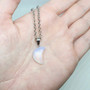 Elegant Opalite Moon on silver plated steel cable chain 70cm long, fits over the head and has a sturdy lobster clasp. Opalite is a man made stone, created to offer an affordable Opalessence bead that is said to bring about positive feelings and positive thinking. Not to be confused with the need to express all of your negative and positive feelings. Just the self understanding, insight and worth to get on top of your mind during time where you feel like you've been travelling up the steepest hill for centuries, it might have in actuality been 2 months. Let's be real, it feels the same. Use Opalite as your guiding light in times of darkness, depressions, empty voids of space and time, giving you the inner strength and consistent persistence to "keep going" during this transition. Because that's exactly what's happening here, you are evolving into a better human.