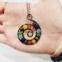 Chakra beads bound in antique copper wire spiral to provoke energy movement for healing. 70cm Surgical Grade Stainless Steel Chain.